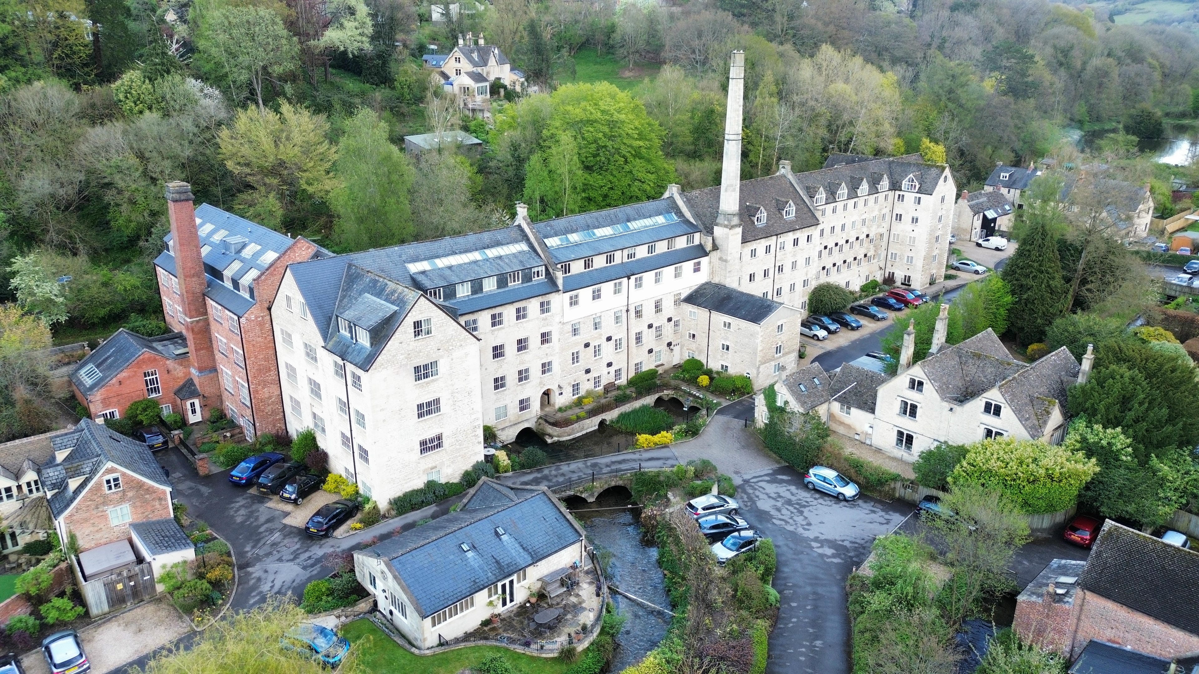 CAA-licensed drone pilot conducting a high-resolution aerial roof inspection